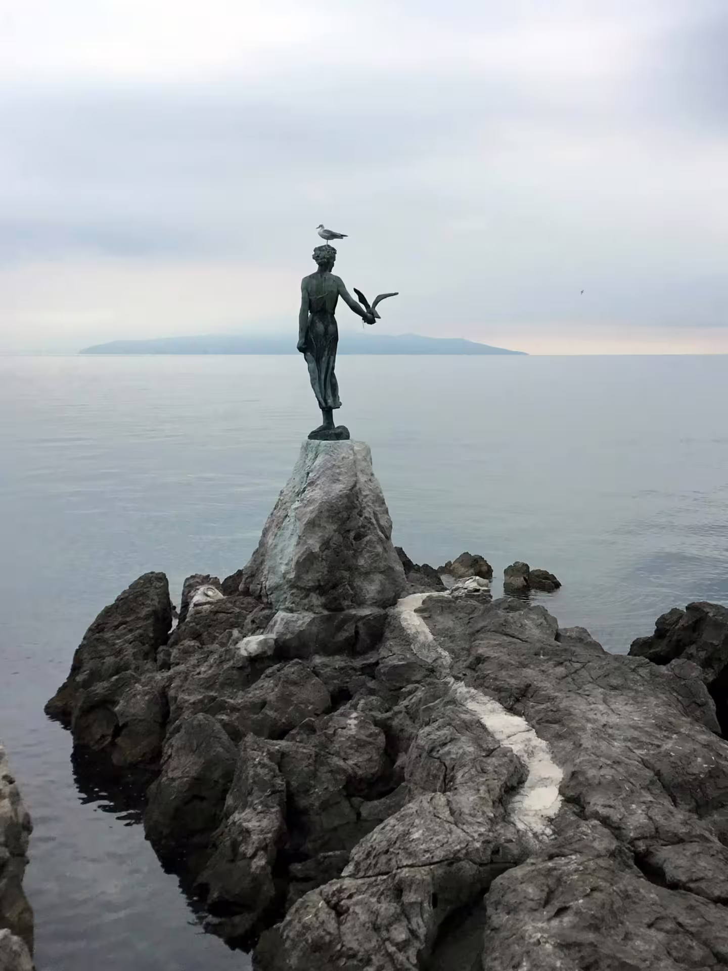 Maiden with the Seagull statue in Opatija on the Adriatic coast, iconic photo stop on Kvarner Bay tour