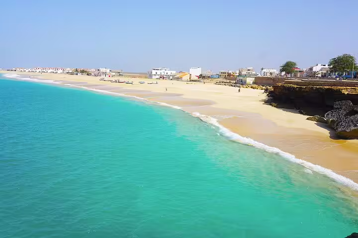 Turquoise beach on Maio near Calheta, scenic coastline view for private harbour to Calheta transfer in Cabo Verde