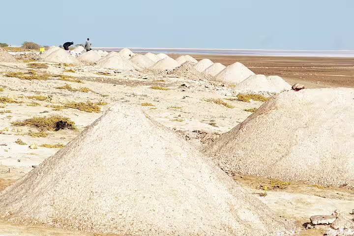 Salt mounds on Maio island coastline, scenic stop on private transfer from Harbour to Calheta, Cape Verde