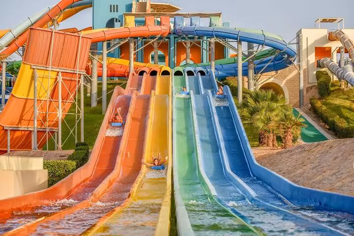 Multi-lane racing slides at Makadi Water World Aqua Park near Hurghada, day use ticket with lunch
