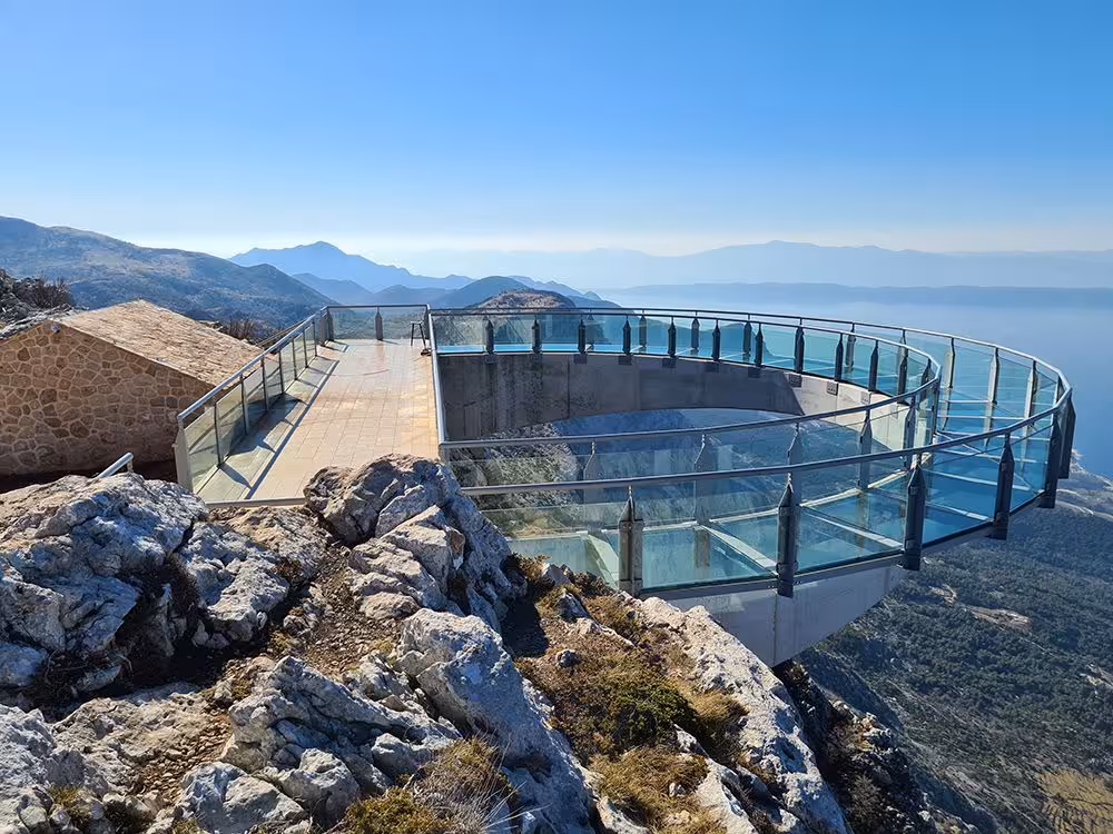 Empty Biokovo Skywalk lookout with glass floor over Makarska Riviera, Split to Skyline cliffview adventure