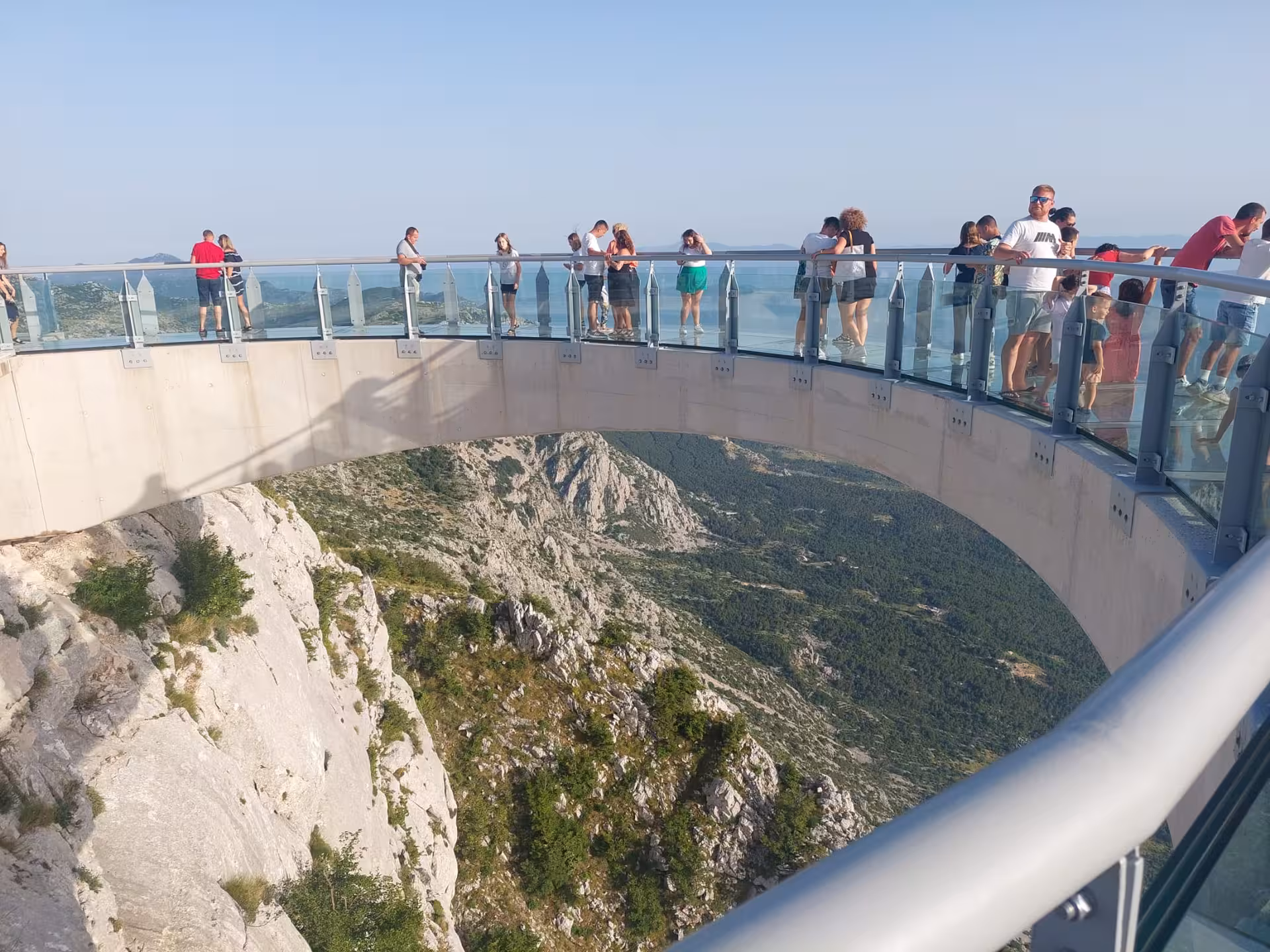 Crowd enjoying panoramic views from Biokovo Skywalk near Makarska on Split to Skyline cliffview tour