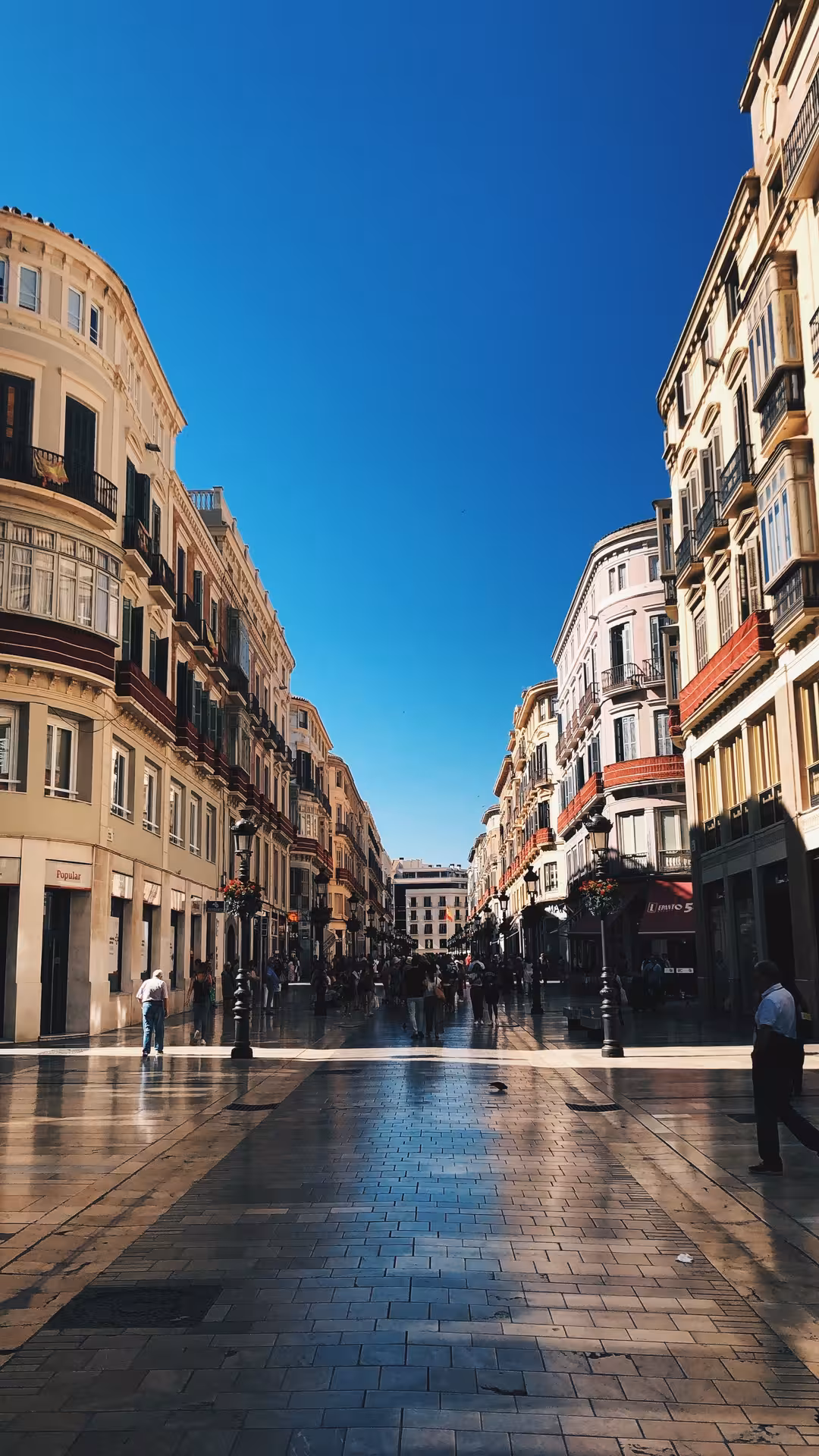 Lively pedestrian street in Malaga Old Town, a key stop on the free walking tour of the historic center