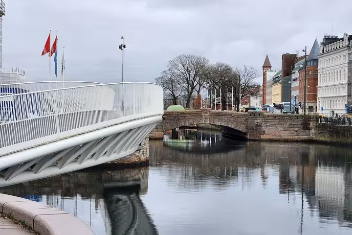 Scenic bridge and canal view in Malmö, perfect for exploring city highlights in a 4-hour tour with bridge and train included.
