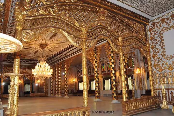Ornate gilded hall inside Manial Palace in Cairo, showcasing royal decor on a guided day tour itinerary