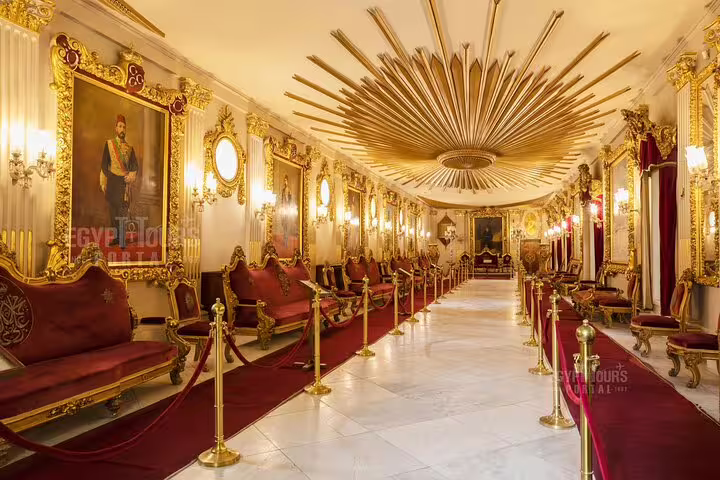 Gilded reception hall inside Manial Palace Cairo, ornate seating and sunburst ceiling on day tour