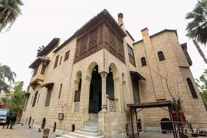 Exterior of Manial Palace Museum in Cairo with arched entrance, featured on the Manial Palace and Cairo Tower day trip