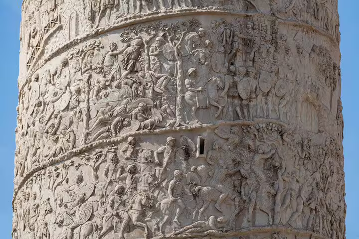 Detailed relief carvings on the Column of Marcus Aurelius in Rome, showcasing ancient Roman history and architecture.