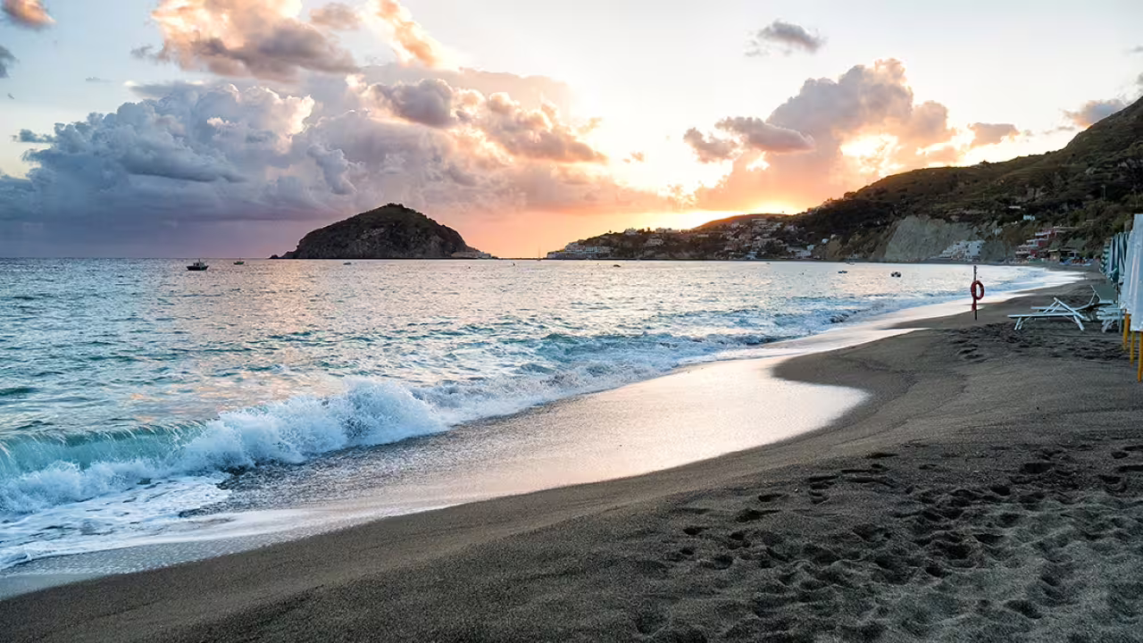 Sunset waves on Maronti Beach, Ischia, on Sant’Angelo and Maronti day tour with Naples transfers