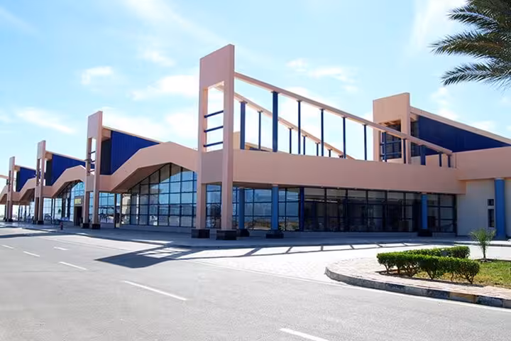 Marsa Alam Airport terminal exterior, meeting point for exclusive private airport transfer and hotel pickup in Egypt