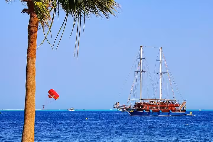 Pirates sailing boat cruising off Marsa Alam toward Turtle Bay, Red Sea, with pickup included