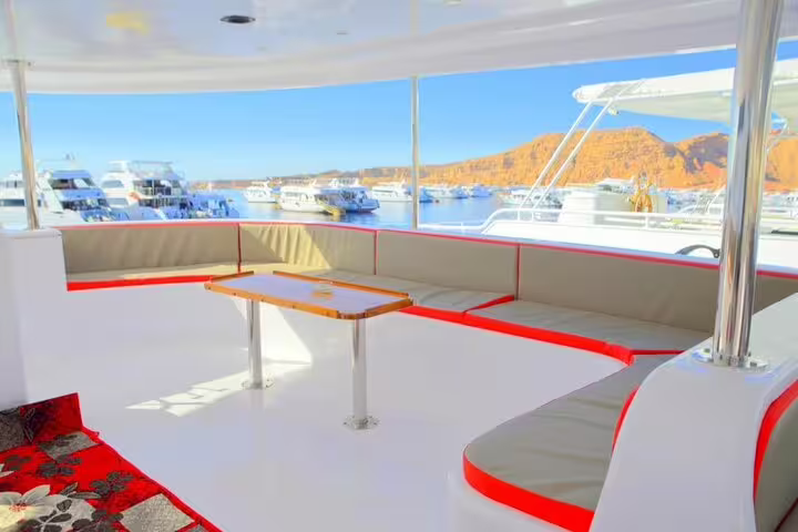 Spacious upper deck seating with sea views in Marsa Alam, heading to Marsa Mubarak for dugong snorkeling