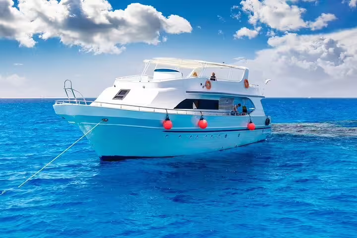 Boat for Marsa Mubarak snorkeling tour in Marsa Alam, Red Sea day trip to see dugong and turtles