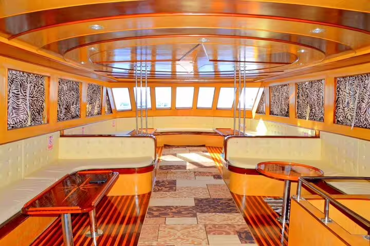 Comfortable boat saloon seating for Marsa Mubarak snorkeling day trip in Marsa Alam, Red Sea Egypt