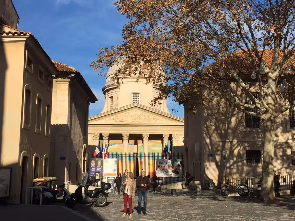 Sunny square near Le Panier in Marseille, scenic walk between tastings on a guided food tour