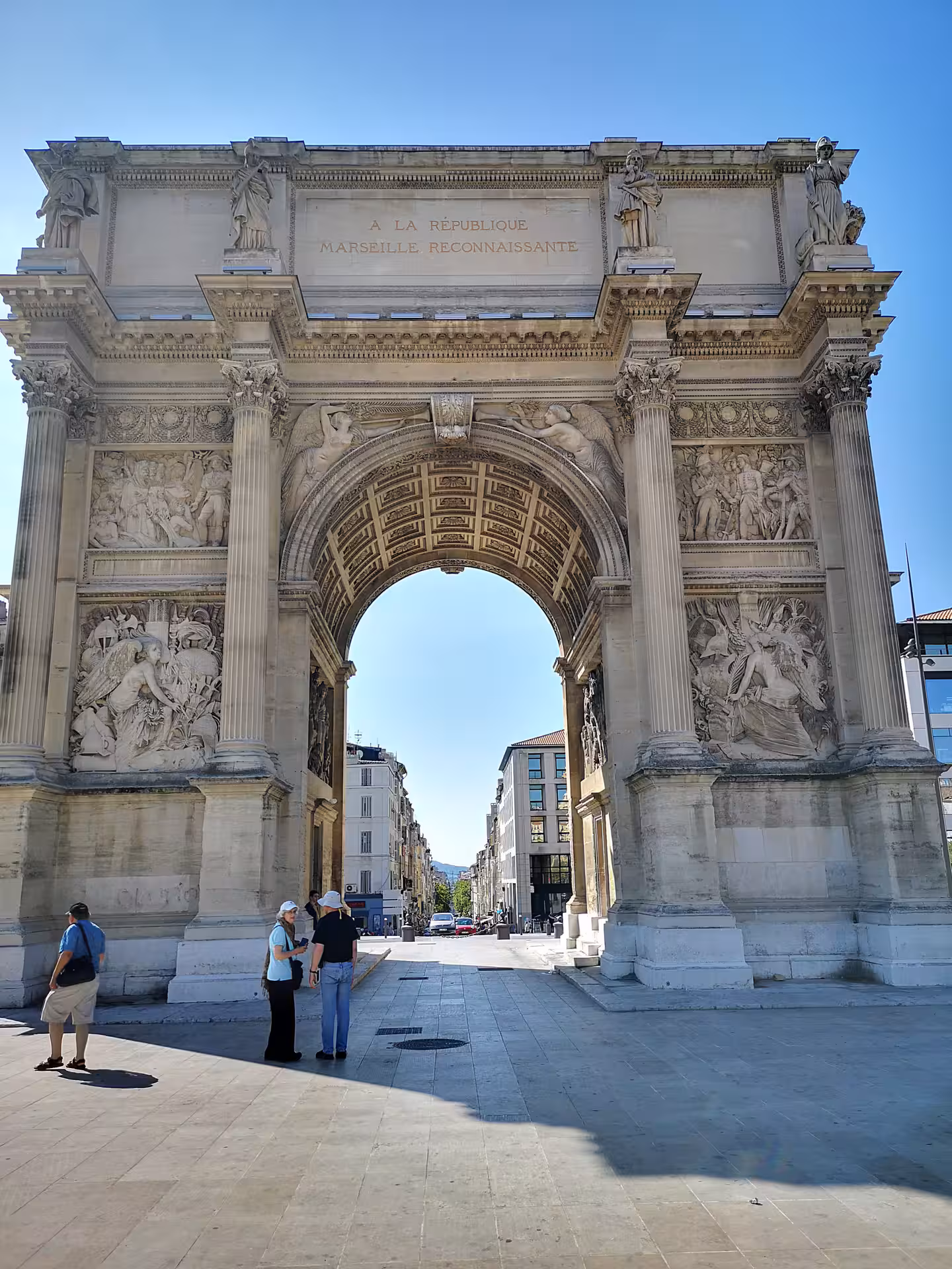 Marseille half-day city tour stop at Porte d’Aix triumphal arch, historic landmark near Vieux-Port in Provence