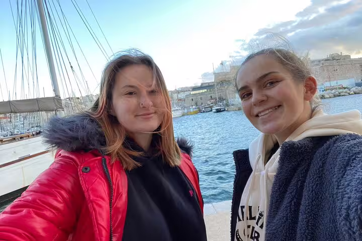 Friends selfie at Marseille Old Port marina, perfect start for a self-guided scavenger hunt sights tour