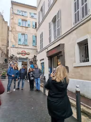 Guided group walk through Marseille Old Town streets, Provence Christian heritage and cultural tour experience