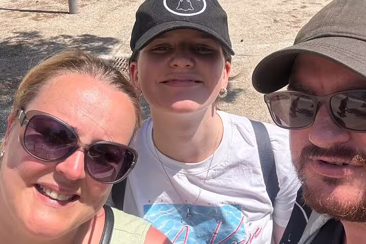 Smiling trio selfie during Marseille scavenger hunt and sights self-guided tour, exploring city highlights
