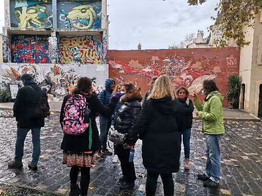 Small group street art tour in Marseille old district, exploring murals with local guide before wine tasting