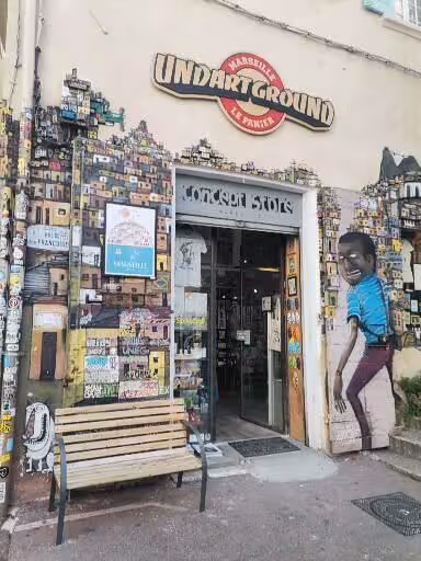 Marseille Underground concept store entrance with vibrant street art wall, featured on old district craft and wine tour