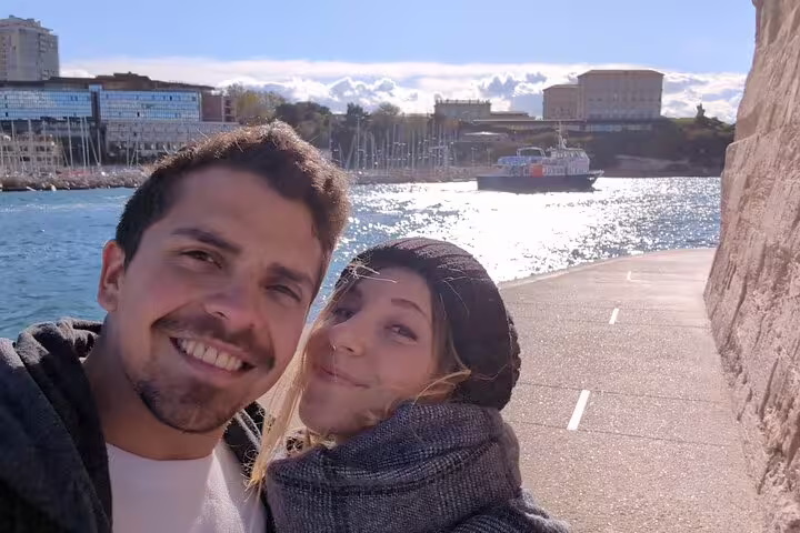 Couple selfie on Marseille waterfront near Mucem, enjoying a self-guided scavenger hunt and sights walk
