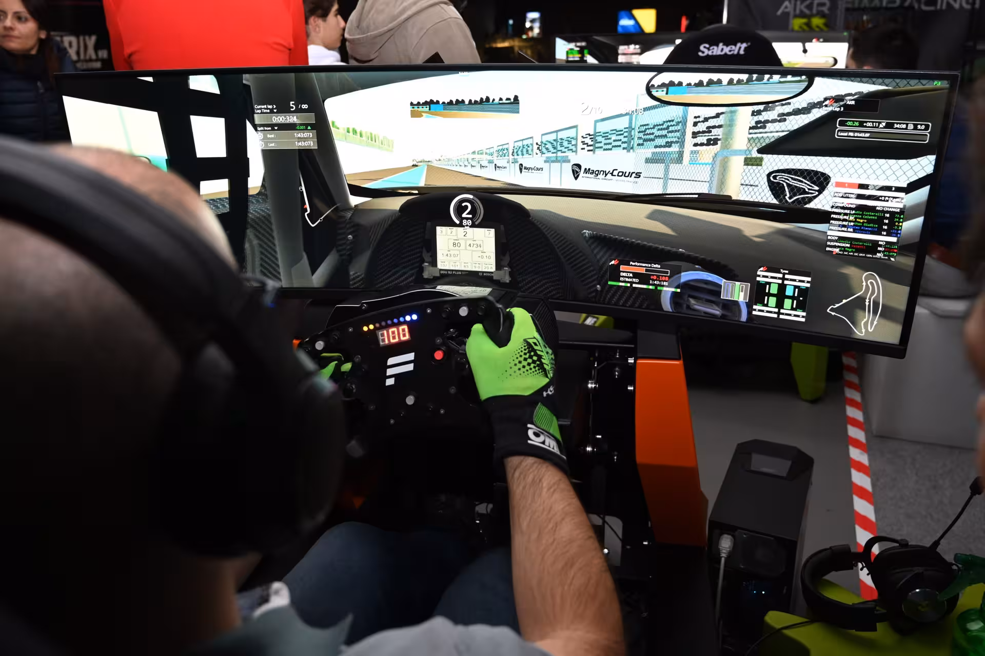Matrix X sim racing setup with pro wheel and data dashboards, immersive motorsport simulator experience