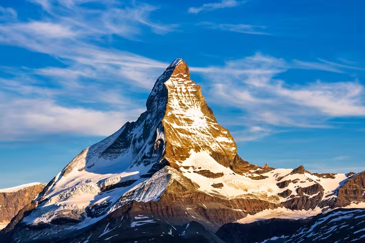 Close-up of the majestic Matterhorn peak under a clear blue sky, a highlight of the Milan to Zermatt private transfer.