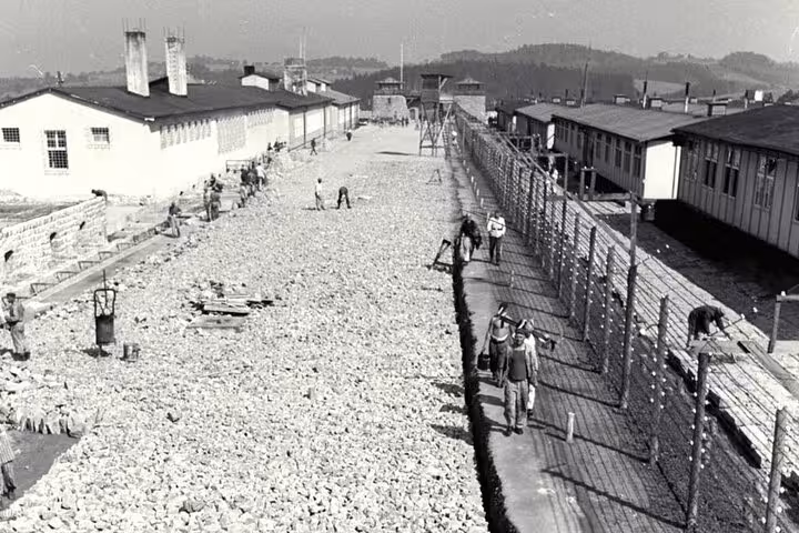 Historic view of Mauthausen concentration camp grounds and fence, visited on private Vienna day tour to memorial