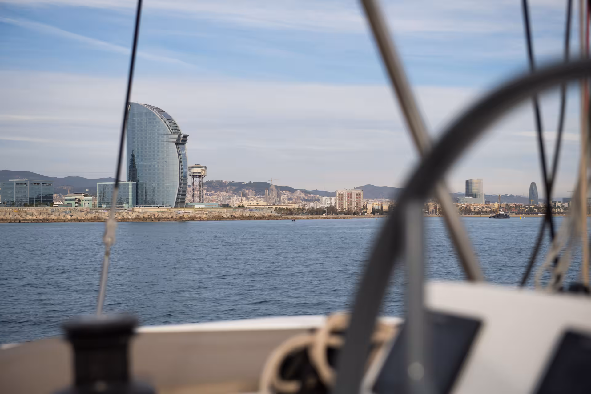 View from a boat toward Barcelona coastline, ideal Mediterranean fishing charter with scenic city skyline