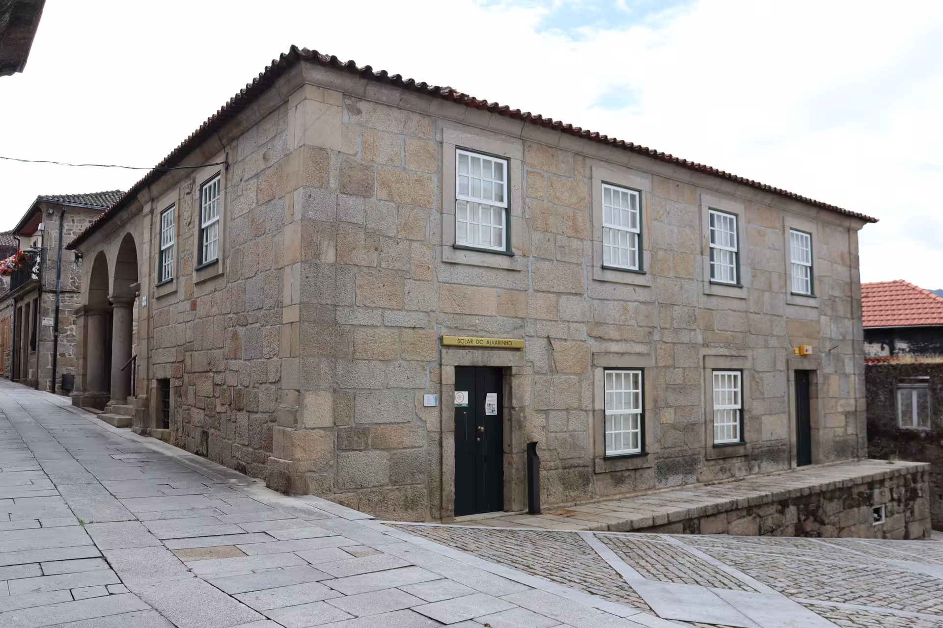 Historic stone building in Melgaço, Portugal, showcasing traditional architecture on a private Alvarinho wine region tour.
