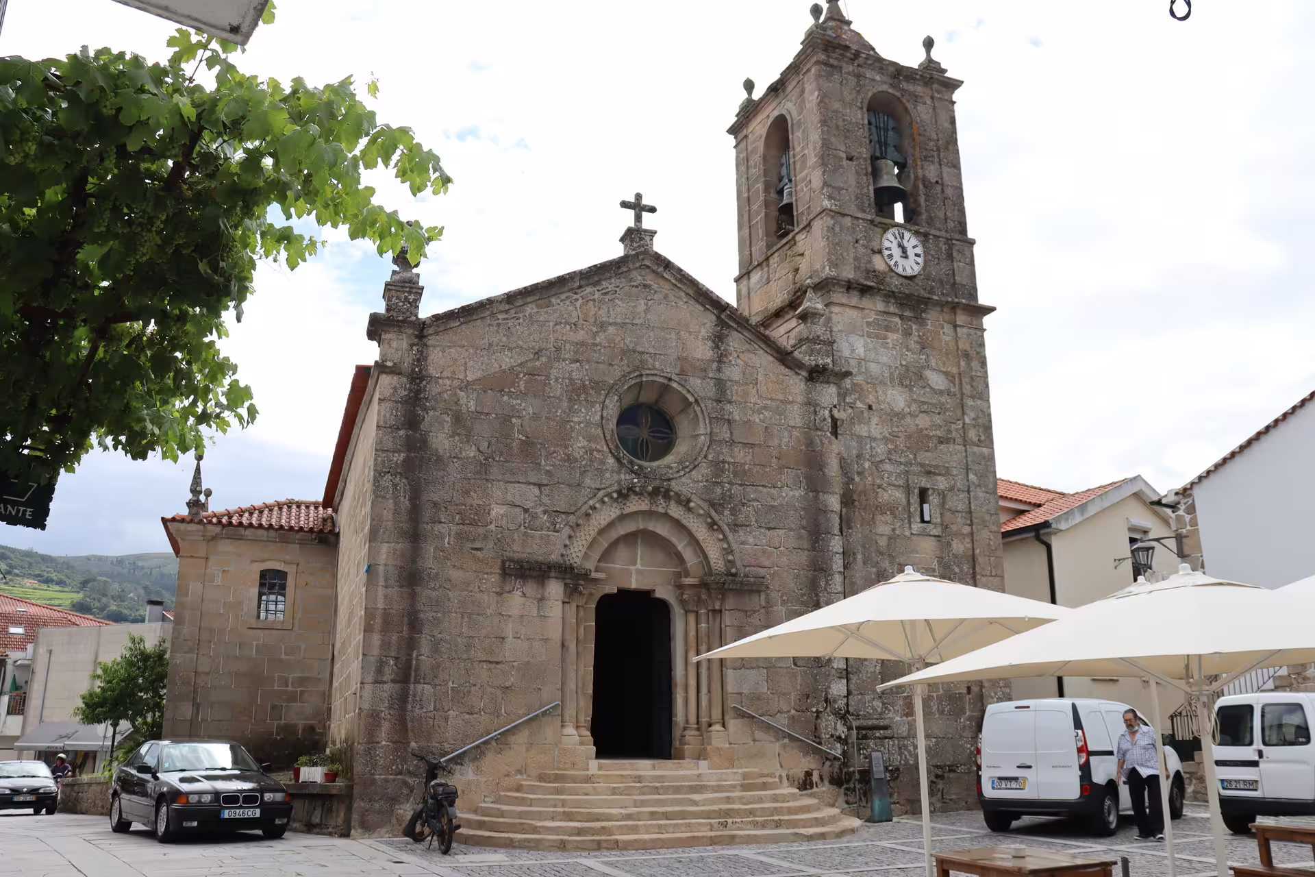 Historic stone church in Melgaço, Portugal, showcasing medieval architecture on a sunny day during a private Alvarinho tour.
