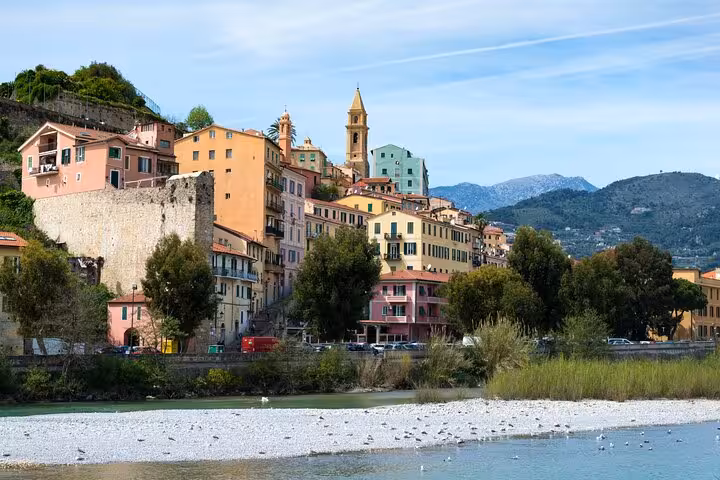 Experience the colorful coastal beauty of Menton with its pastel buildings and scenic Mediterranean backdrop.