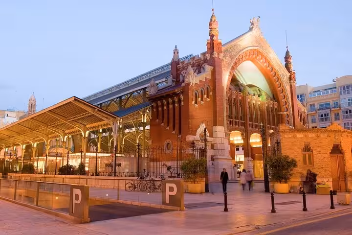 Mercado de Colón Valencia at dusk, a scenic stop on the gourmet tapas tour by bike or on foot