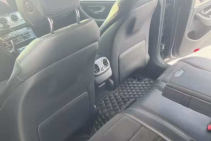 Spacious rear seats in Mercedes for Athens center to Piraeus Port private departure transfer, comfortable ride