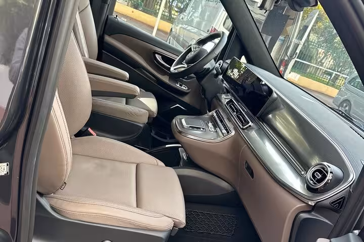 Spacious leather interior of Mercedes van for private Avignon to Marseille Airport transfer with premium comfort