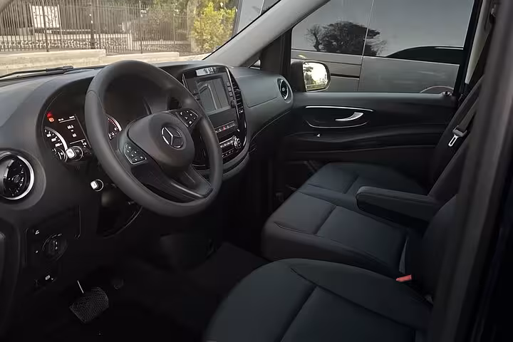 Luxurious interior of a Mercedes van for private transfer from Amalfi Coast to Rome, offering comfort and style.