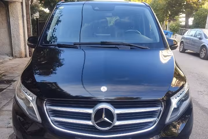 Black Mercedes van for Piraeus Port or Athens hotel to Athens Airport private transfer with driver