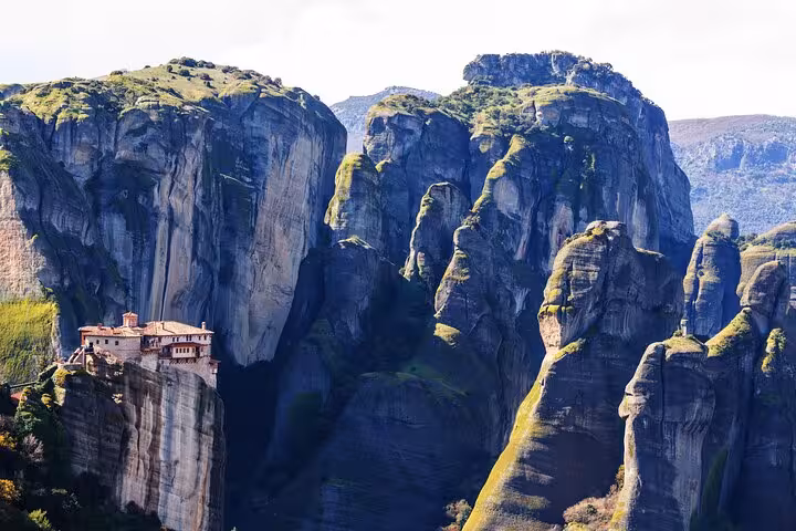 Panoramic Meteora rock formations with monastery, breathtaking view on full-day private tour from Athens