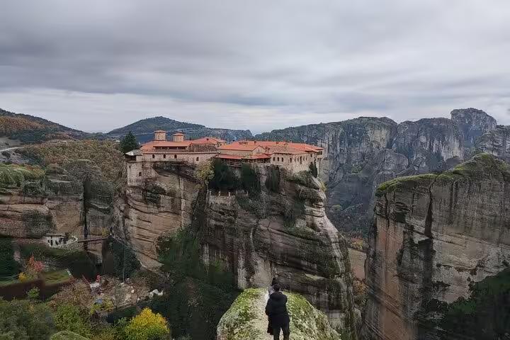 Meteora monastery perched on towering cliffs, panoramic view on a 2-day luxury private tour from Athens