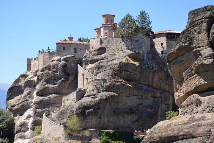 Monastery perched on Meteora rock formations, a highlight of the 6-day private tour in Greece.