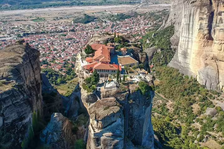 Aerial view of Meteora monastery above Kalambaka valley, must-see on Delphi and Meteora two-day tour Greece
