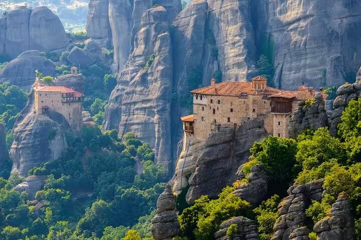Meteora monastery on towering rock cliffs, highlight stop on a private day trip from Athens