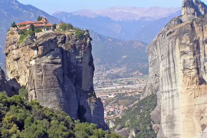 Panoramic Meteora rock formations and monastery on a private day trip from Athens, Greece, overlooking the valley