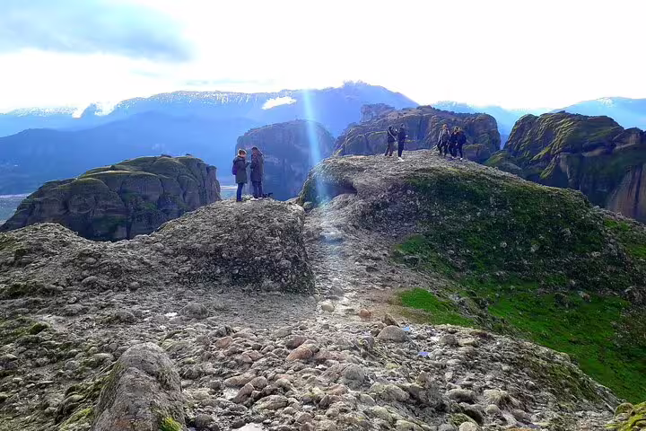 Experience the stunning Meteora rock formations with panoramic views on a 4-day classical tour from Athens.