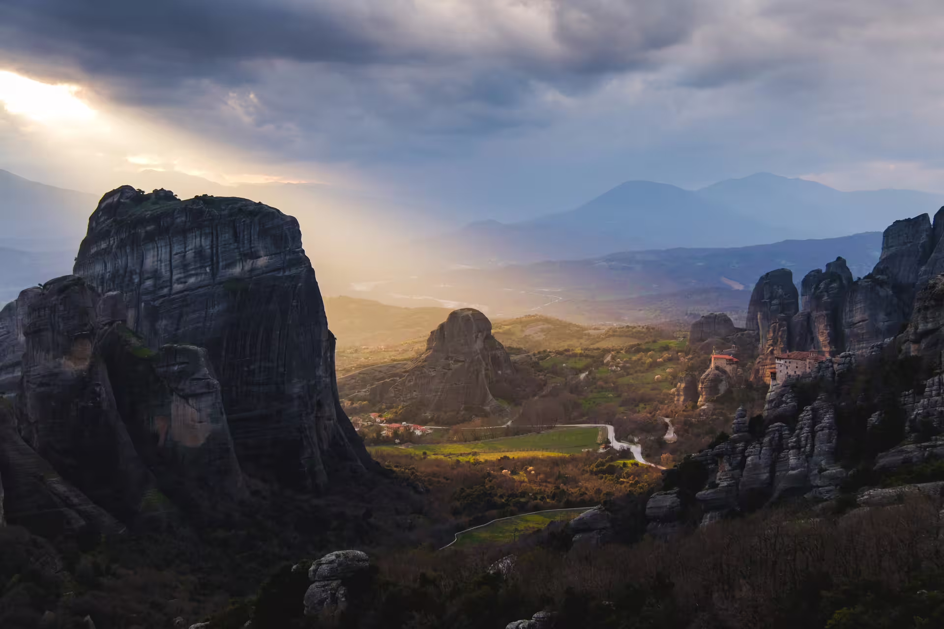 Sunset over Meteora rock pillars and valleys near Kalambaka on a 2-day private tour from Athens with overnight stay