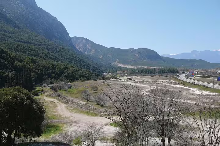 Scenic valley and mountains near Thermopylae en route to Meteora on full-day tour from Athens with dinner included