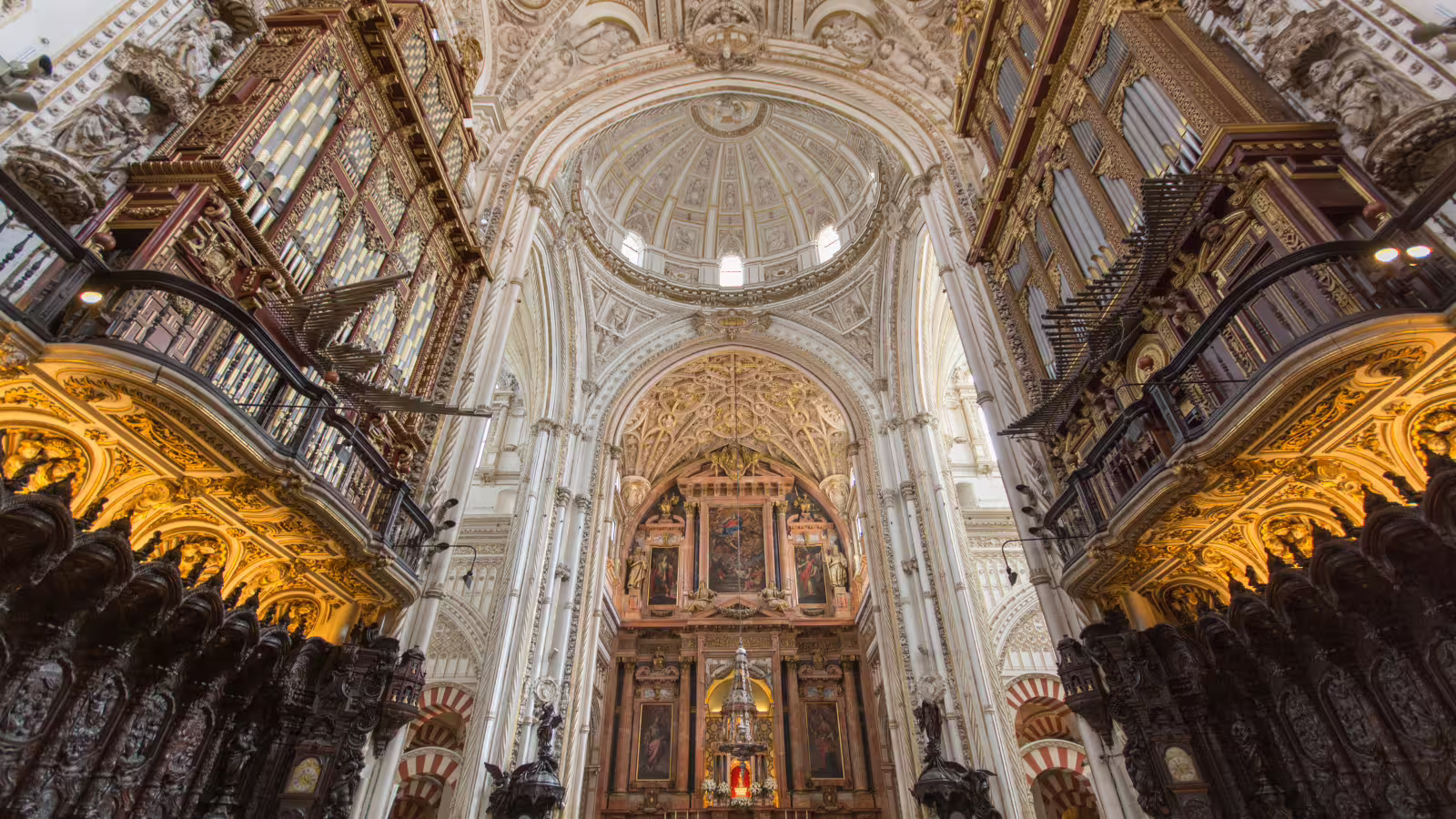 Mezquita-Catedral of Córdoba interior with ornate arches and choir, highlight on private walking tour