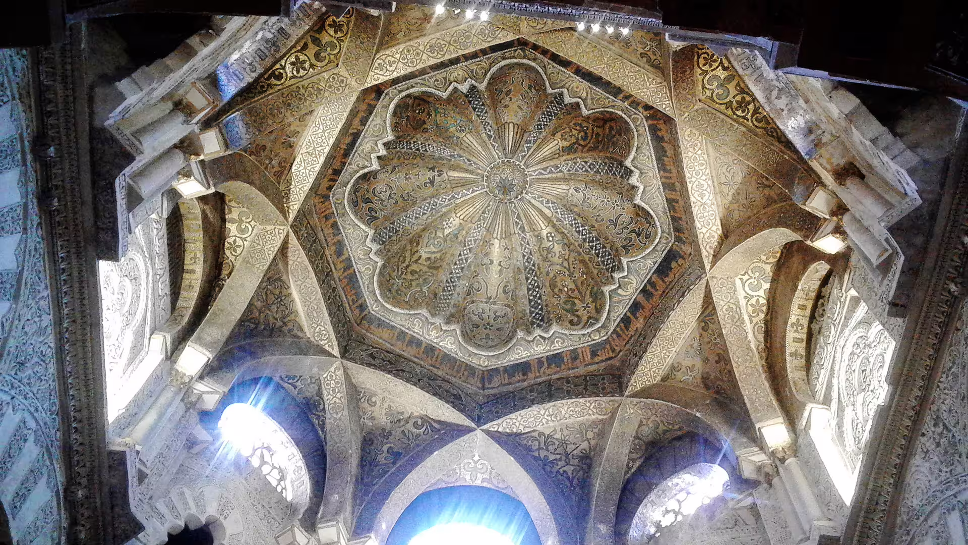 Ornate dome ceiling inside the Mezquita-Catedral, a highlight of the Cordoba group walking tour in Spain