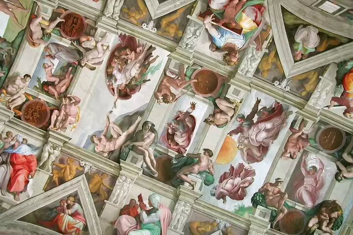 Close-up of Michelangelo frescoes on Sistine Chapel ceiling visited on Colosseum and Vatican Museums fast track guided tour